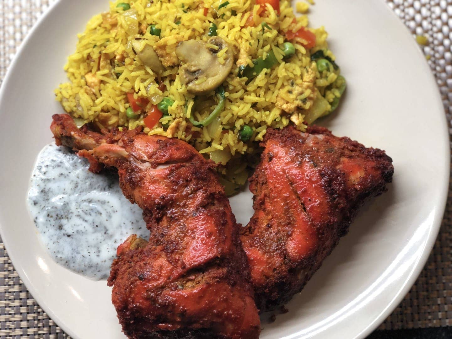 Plate of Tandoori Chicken, Special Fried Rice, and Raita